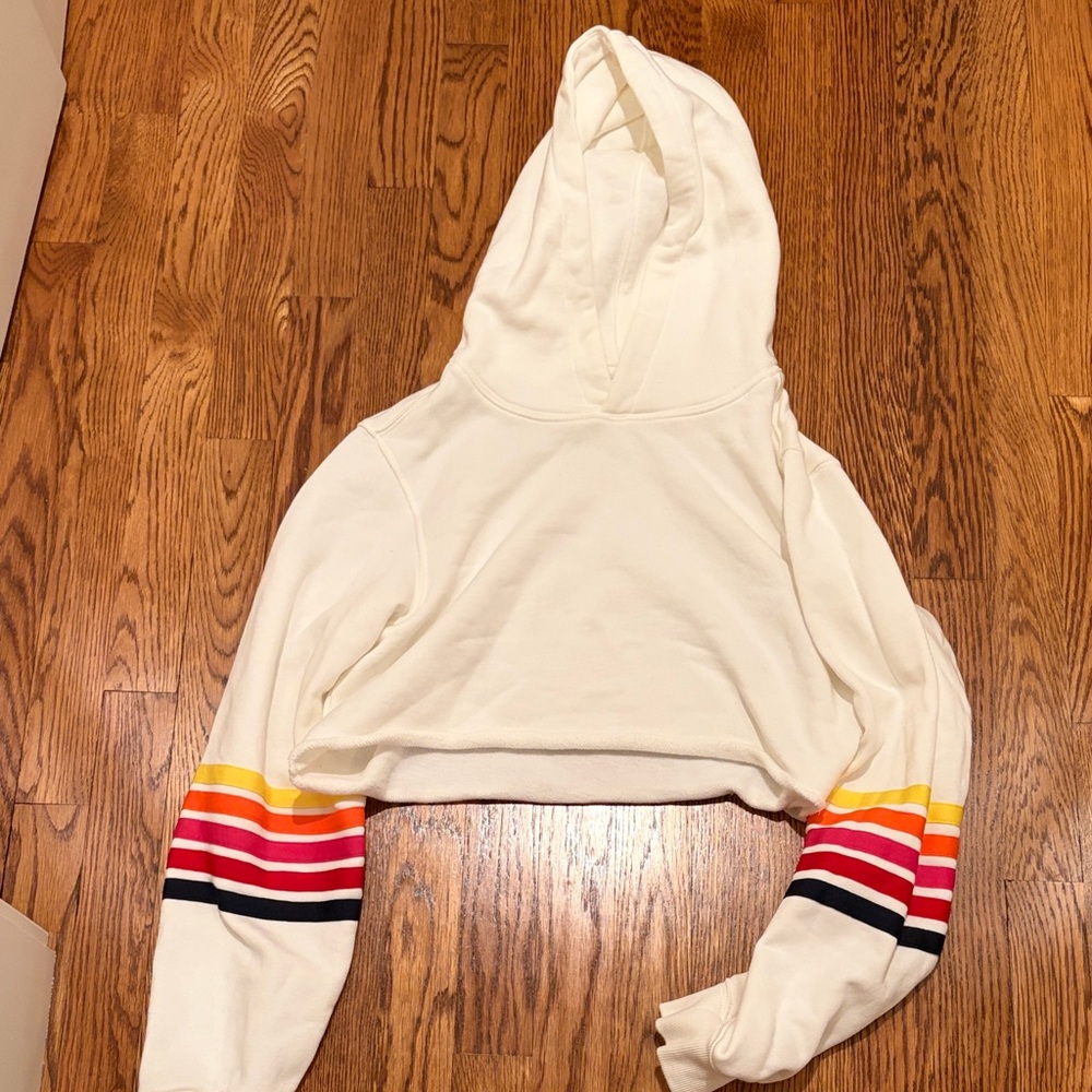 Cozy Cream Cropped Hoodie with Colorful Stripes